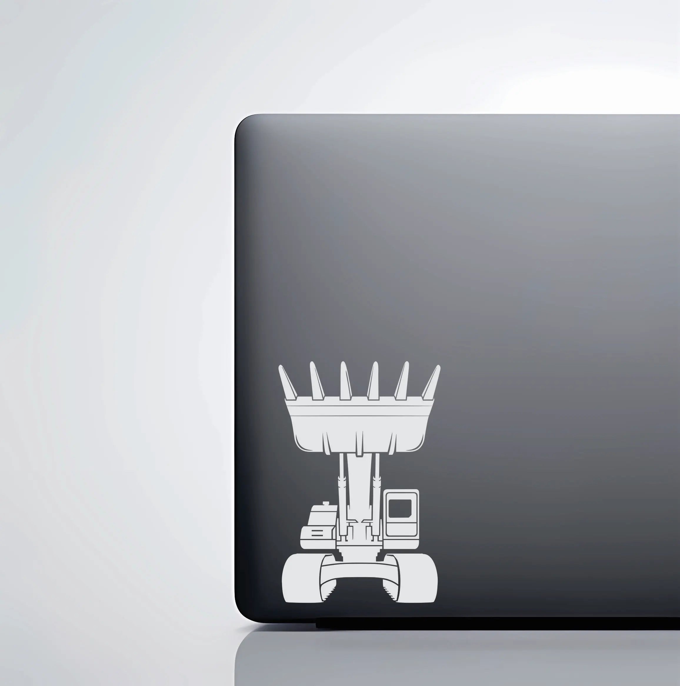 Crown-style excavator vinyl decal shown on tumbler and laptop, a clean heavy equipment sticker for job-site crews and machine drivers.