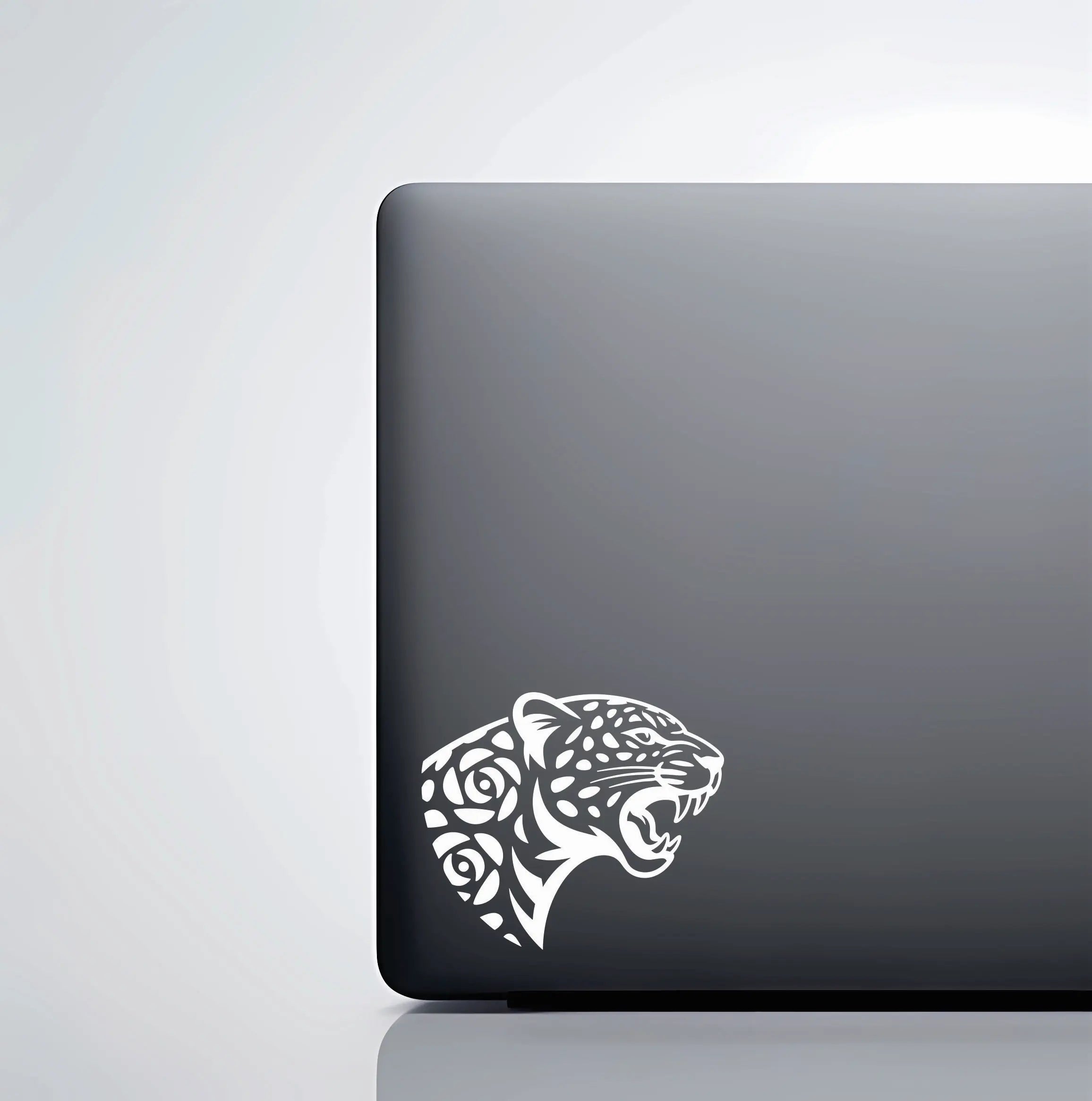 Floral jaguar vinyl decal used as a laptop sticker for wildlife and art lovers; crisp lines and easy placement for everyday gear.