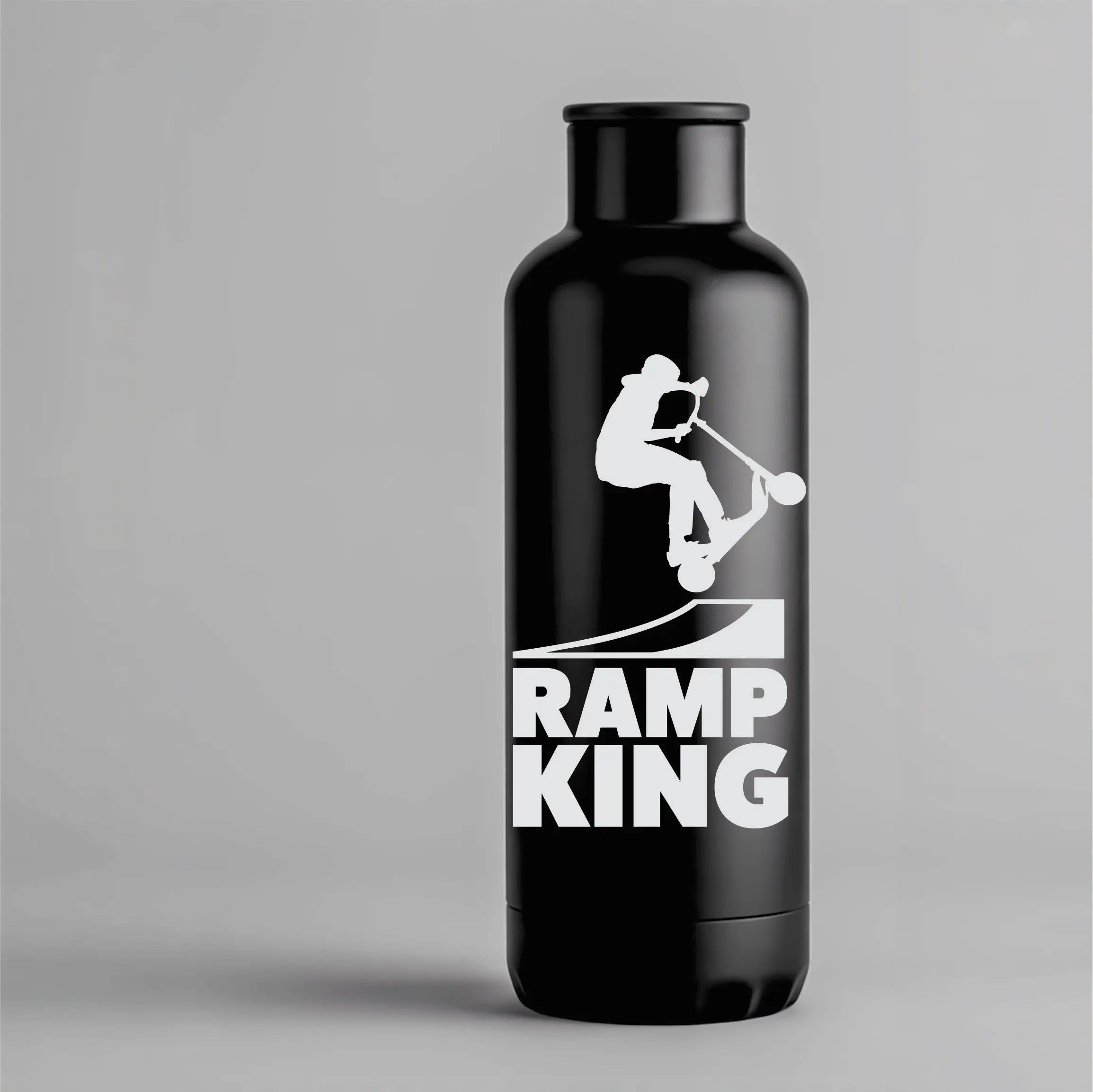Stunt scooter vinyl decal with rider jumping off a ramp and “ramp king” text, a bold park sticker for cars, helmets and teen laptops.